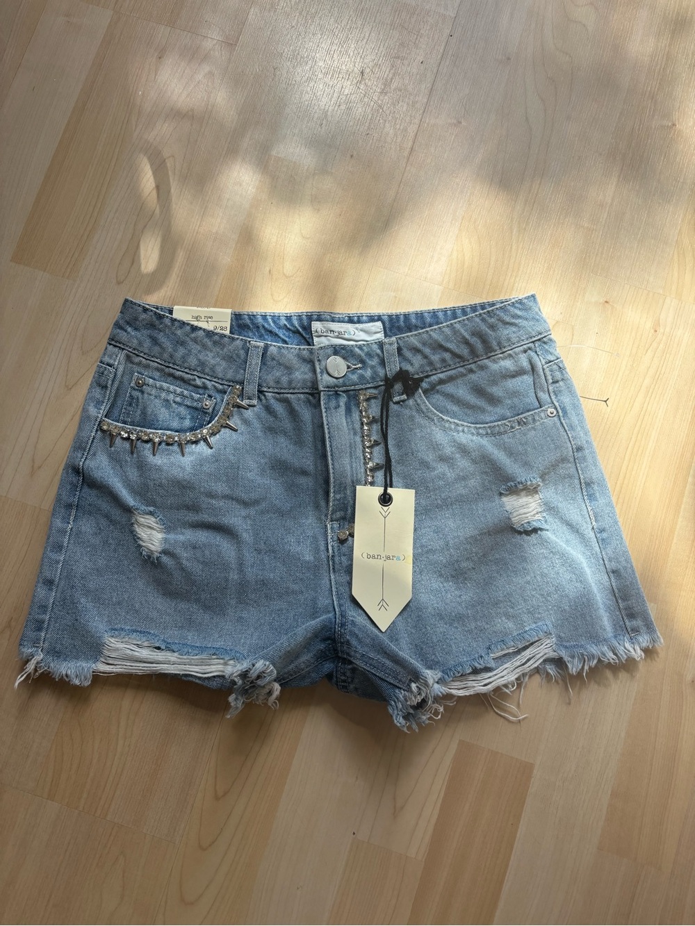 Distressed Light Blue Denim Jean Shorts with Stud Trim Women’s 9/28